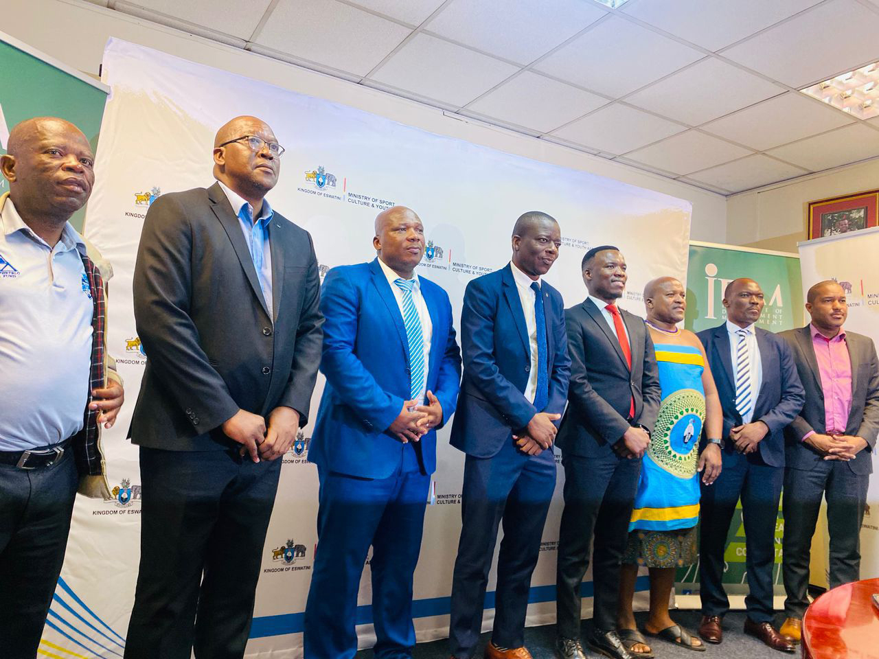 Minister for Sports, Culture and Youth Affairs Bongani Nzima (4th L) and IDM Country Director Karabo Baipidi (4th R) line up with other top officials during the signing of the landmark agreement. (Pic: Ncamile Ngozo)
